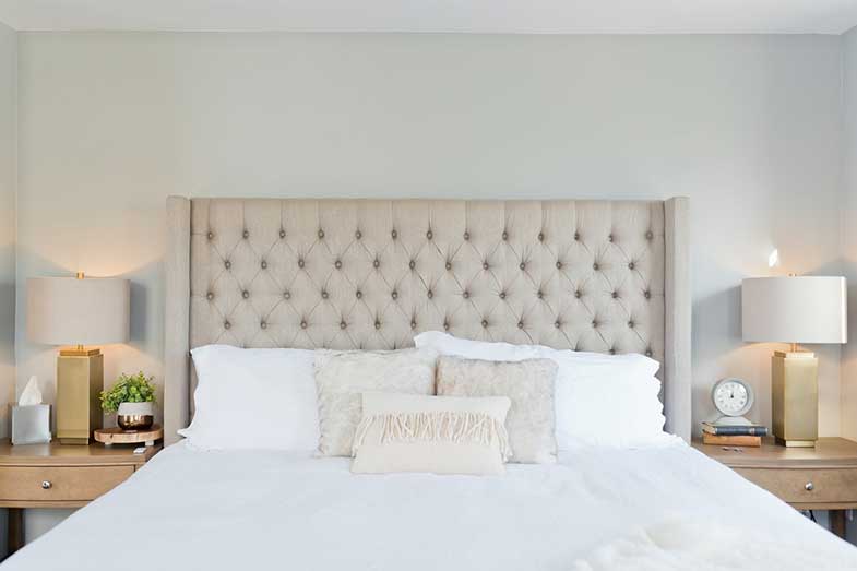 large white bed pillows headboard