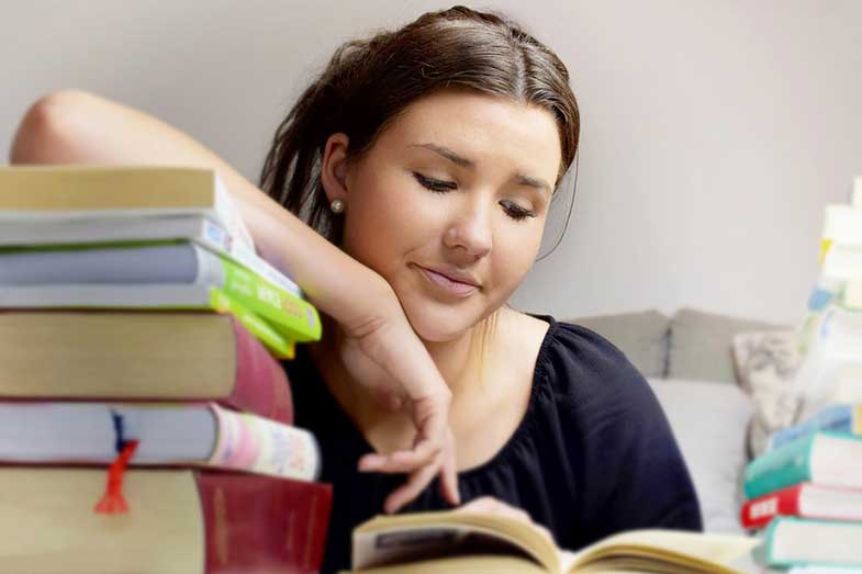 Tired Girl Reading Book