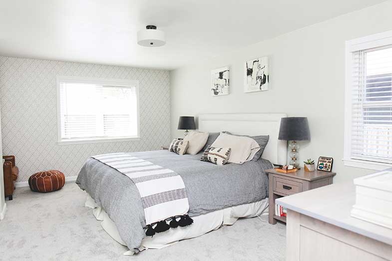 Large Bed with Gray Comforter